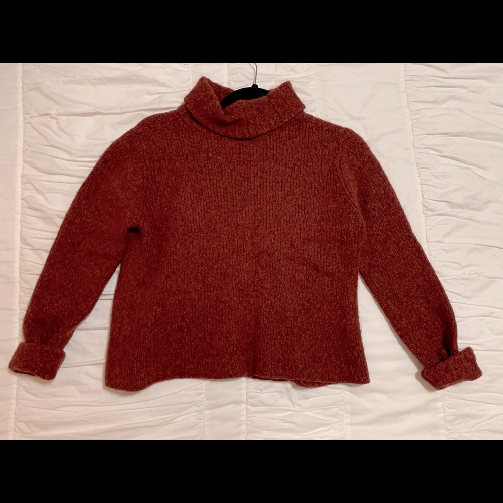 Deep red sweater